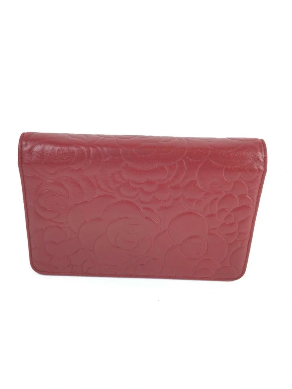 CHANEL Camellia-Embossed Leather Clutch in Deep Red with Silver CC